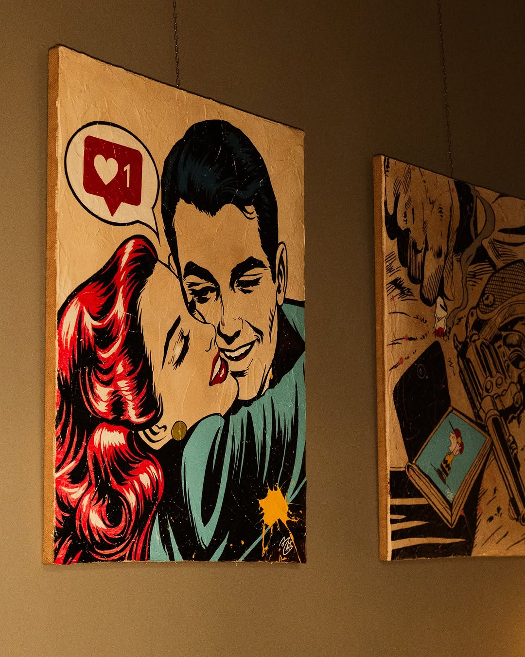 Pop art style painting of a smiling man and woman with red hair, with a heart icon and number one.