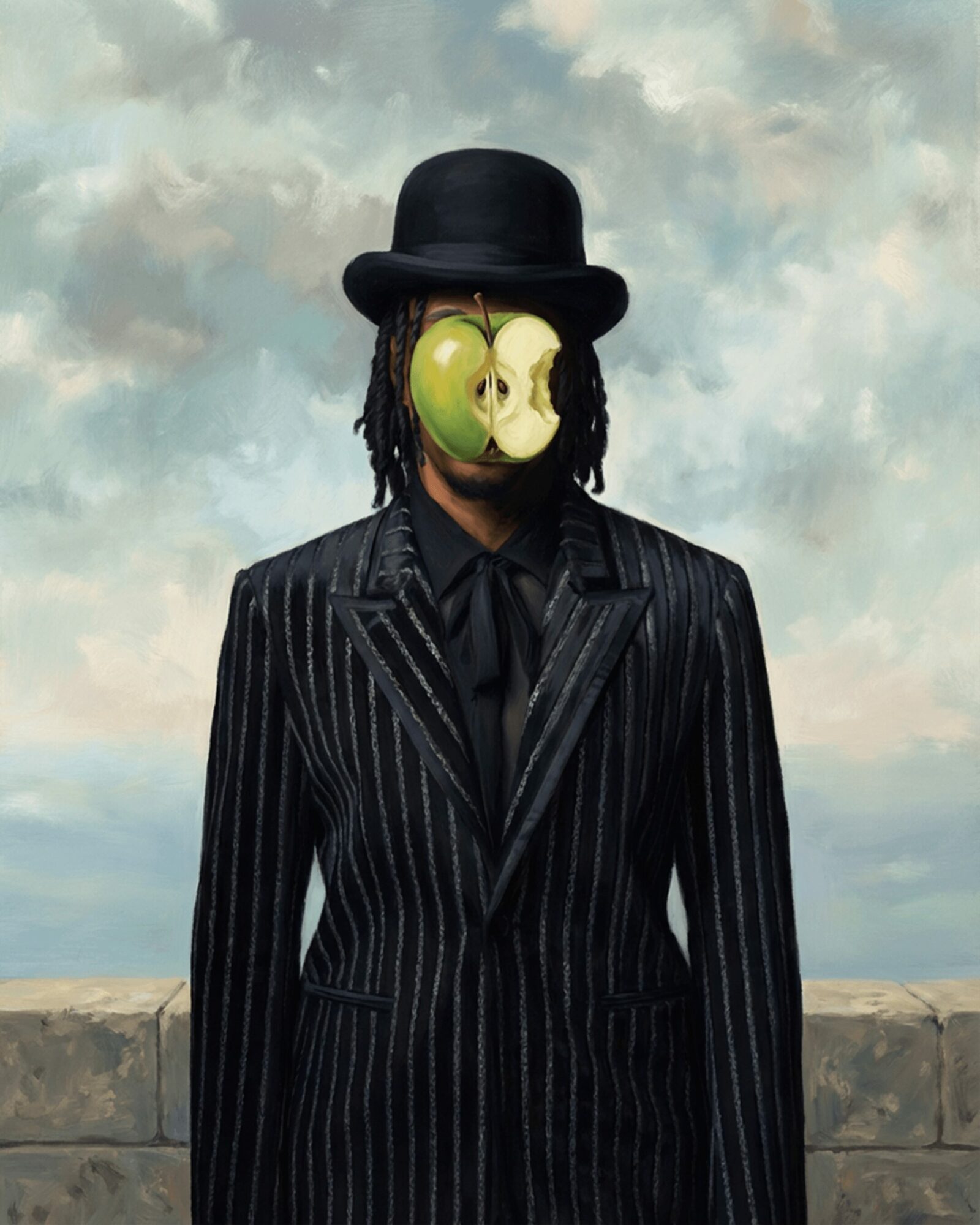 Person wearing a pinstripe suit, black hat, and a mask with a green apple and a sliced apple half, standing outdoors.