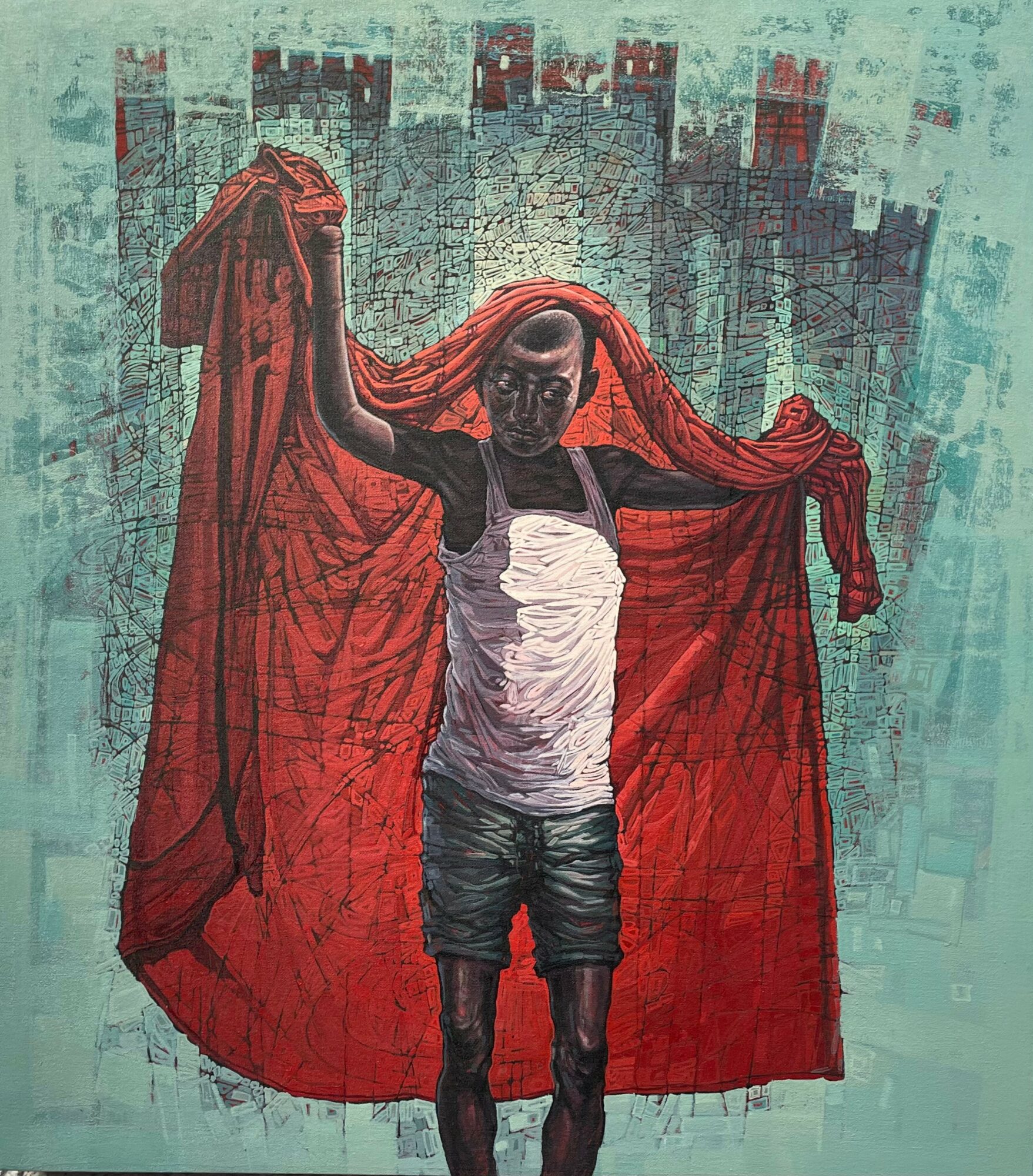 Person holding a large red cloth in front of a castle-like background, wearing a white shirt and shorts.
