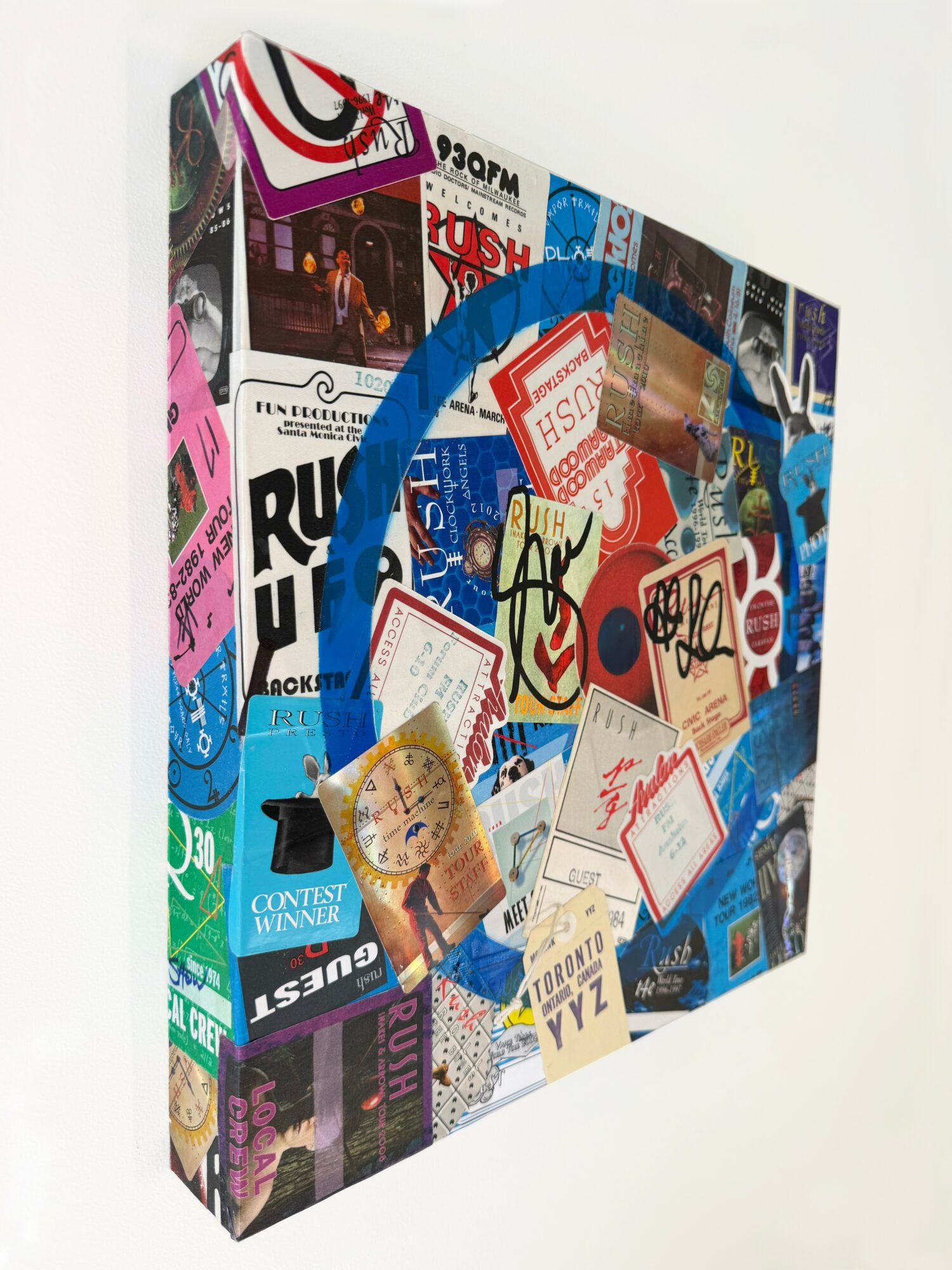 A collage of various colorful posters, stickers, and graffiti art with a blue circle in the center, on a white background.