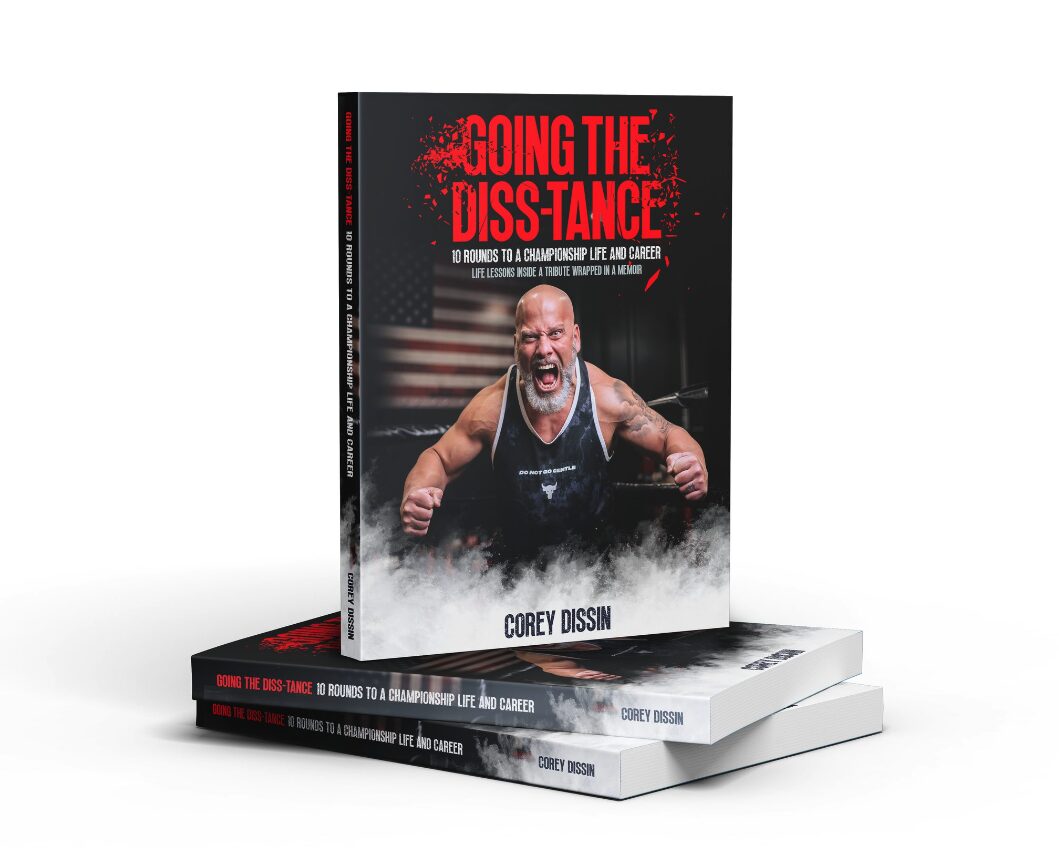 Three books stacked, top book titled 'Going the Diss-Tance' with a man shouting on the cover.