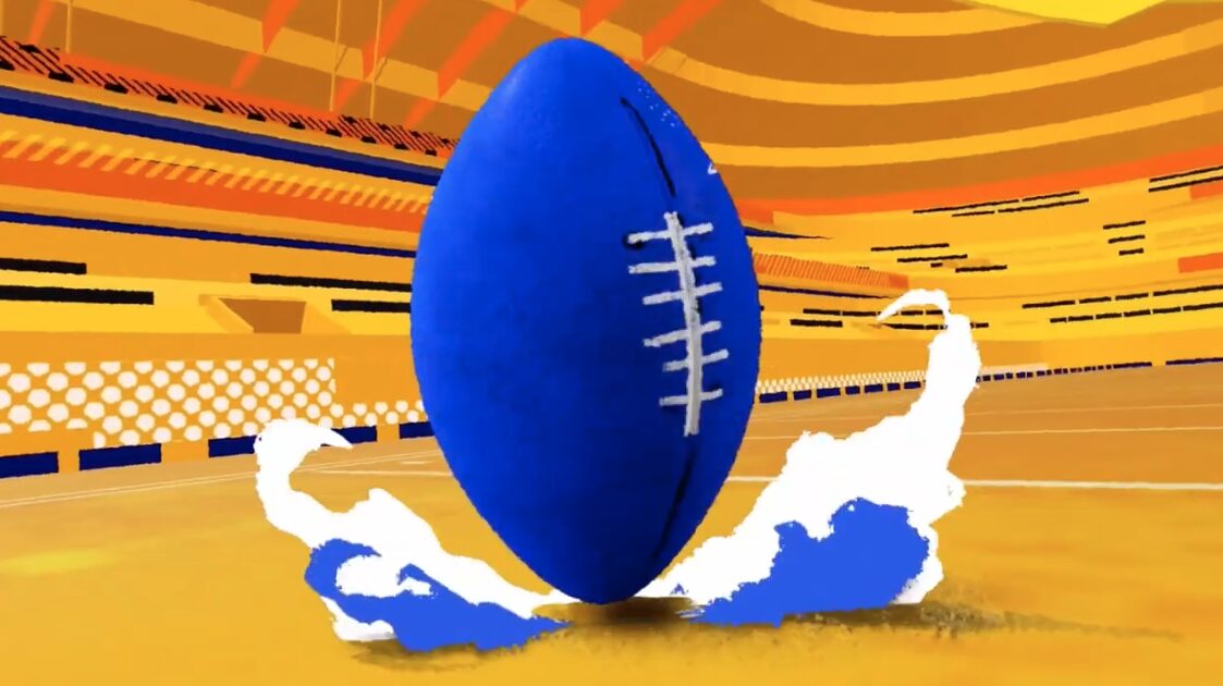 Blue football with white stitching on a yellow field, with a stylized stadium background, and splash effects around the ball.