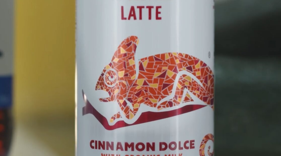 Can with a fox illustration made of mosaic-like orange and red shapes, and the word 'LATTE' above it.