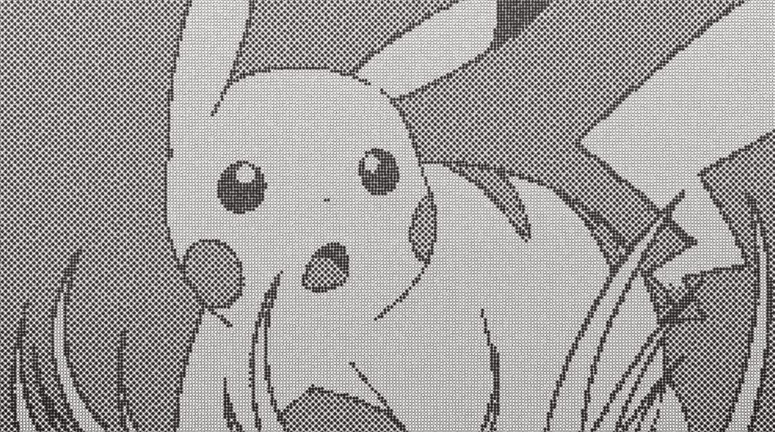 Pikachu with wide eyes and open mouth, looking surprised or shocked, in a grayscale image.