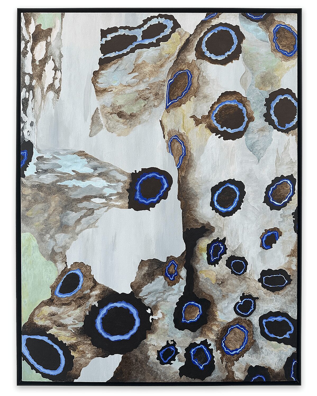 Abstract painting with rocks and circular patterns in black, blue, and beige tones, resembling a natural landscape.