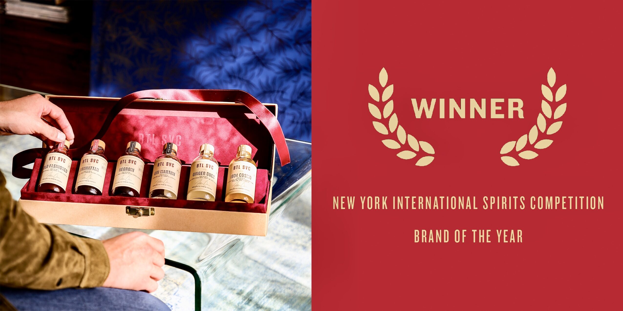 Person holding a box of five bottles of spirits, with a red award banner reading 'WINNER' and 'New York International Spirits Competition' below.