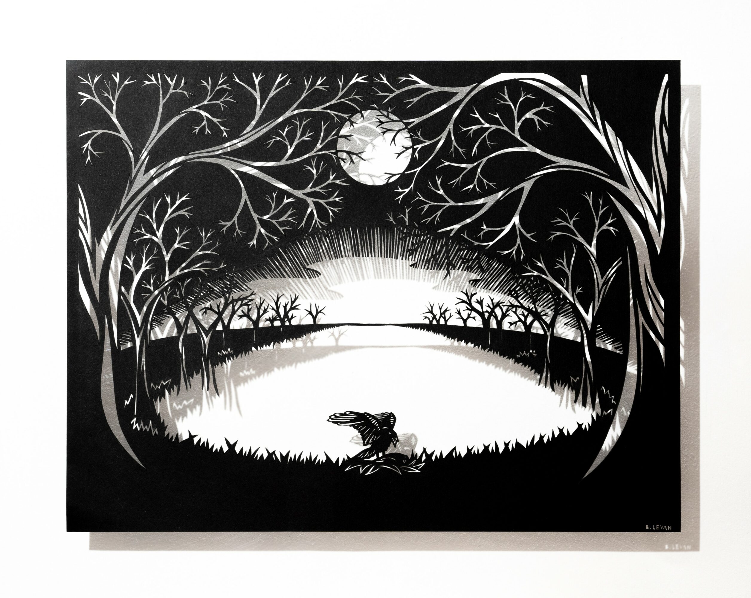 Silhouette of trees and a frog near a pond under a full moon, in black and white, with a glowing horizon.