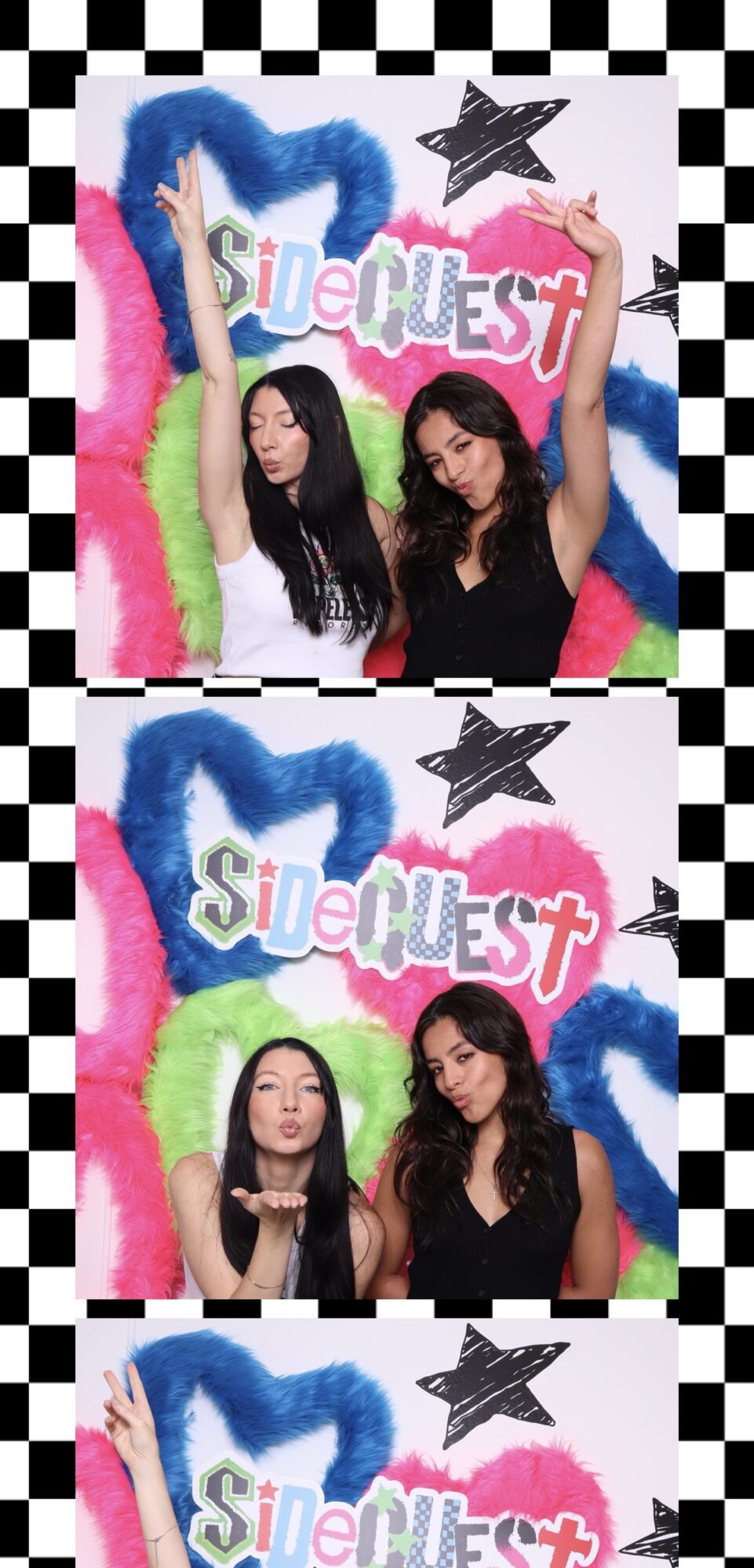 Two women posing in front of a colorful backdrop with a star and text, making different gestures, smiling, and looking at the camera.