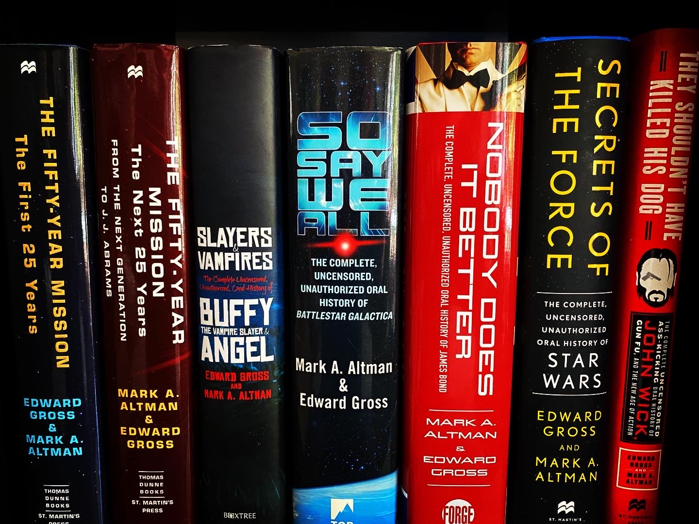 Bookshelves filled with science fiction and fantasy books, including titles like 'The Fifth Element', 'Slayers Vampires', and 'Secrets of the Force'.