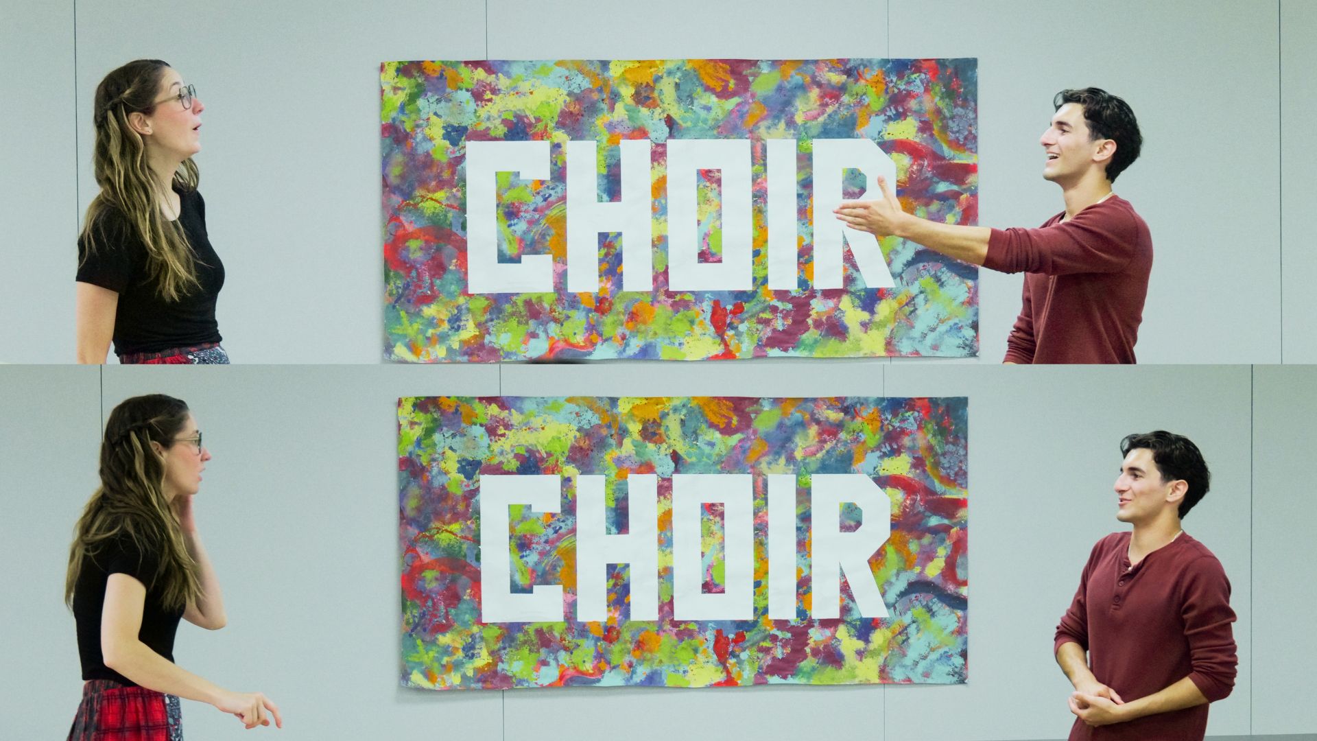 Two people standing on opposite sides of a colorful sign that says 'CHOIR'.
