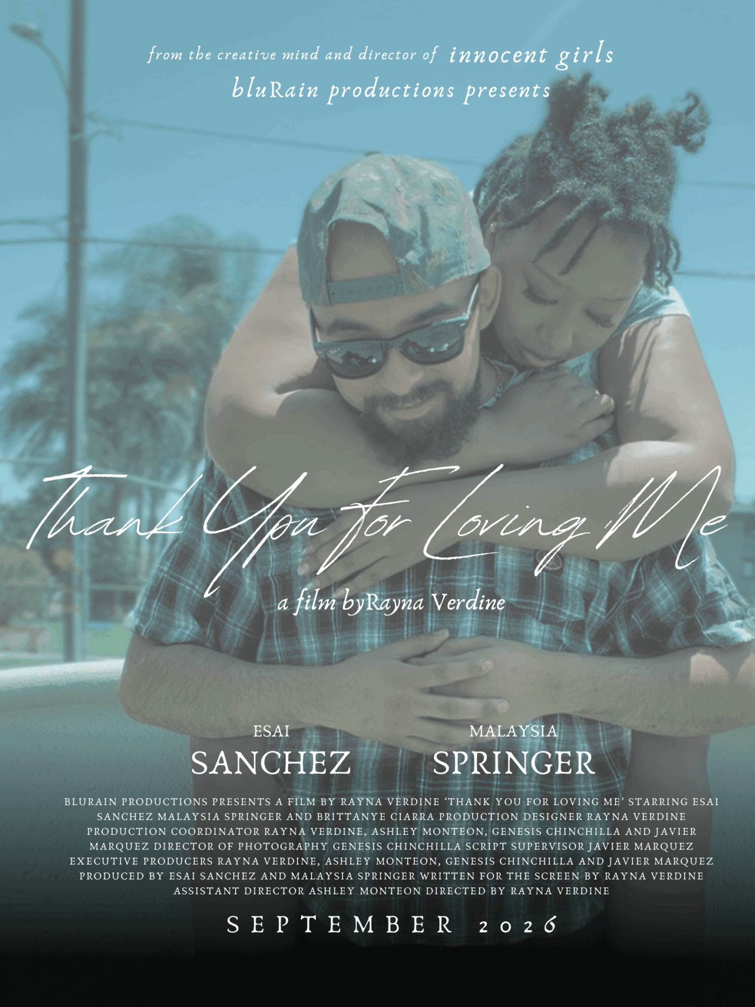 A man with sunglasses holds a young girl with braided hair, both smiling outdoors. Text thanks for loving me, September 2023.