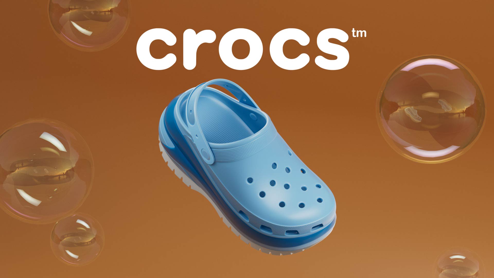 Blue Crocs shoe with holes, floating on a brown background with bubbles, and the Crocs logo above.