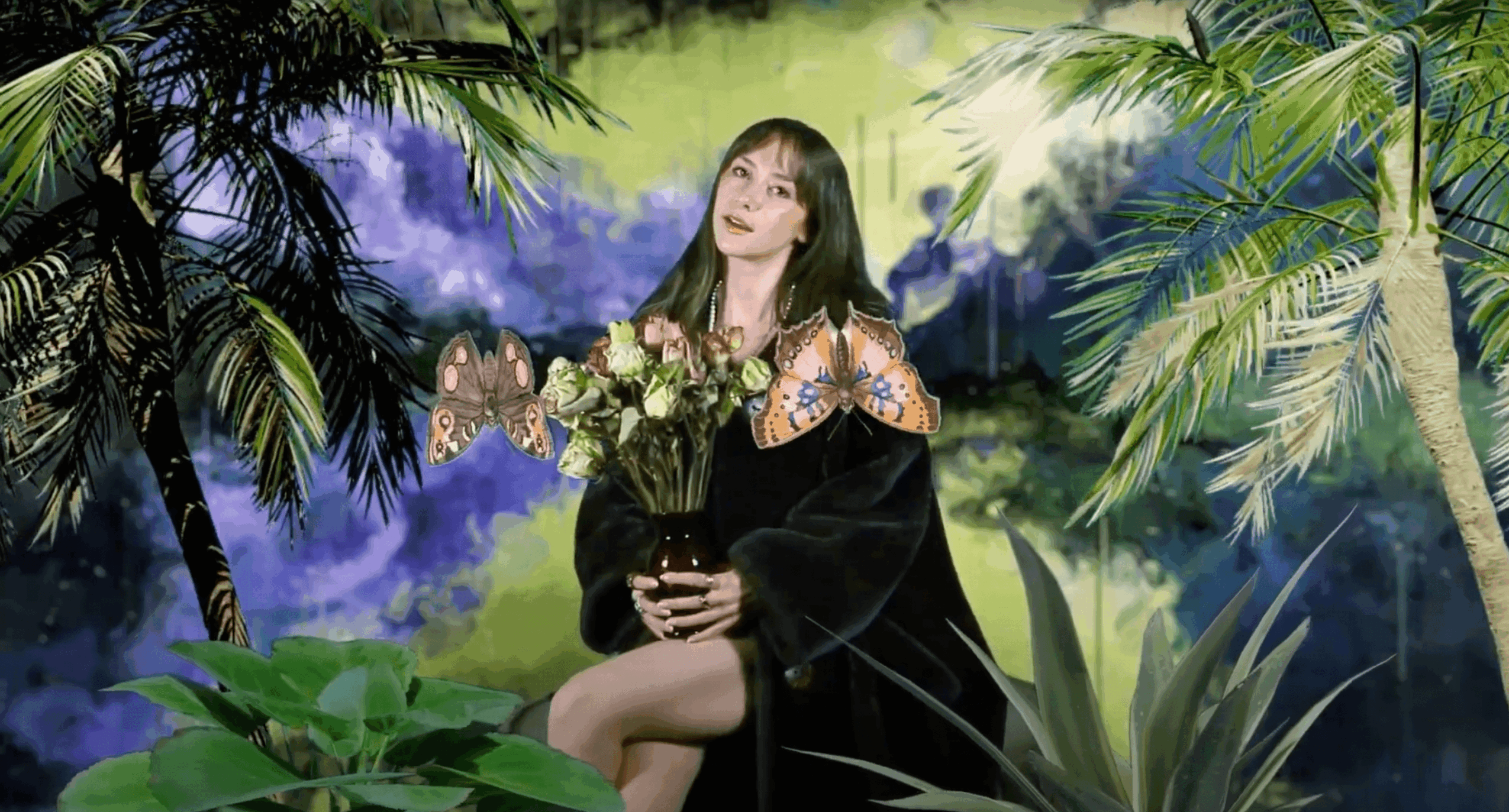 Young woman with long hair holding a bouquet of flowers in a lush, tropical setting with palm trees and vibrant background.