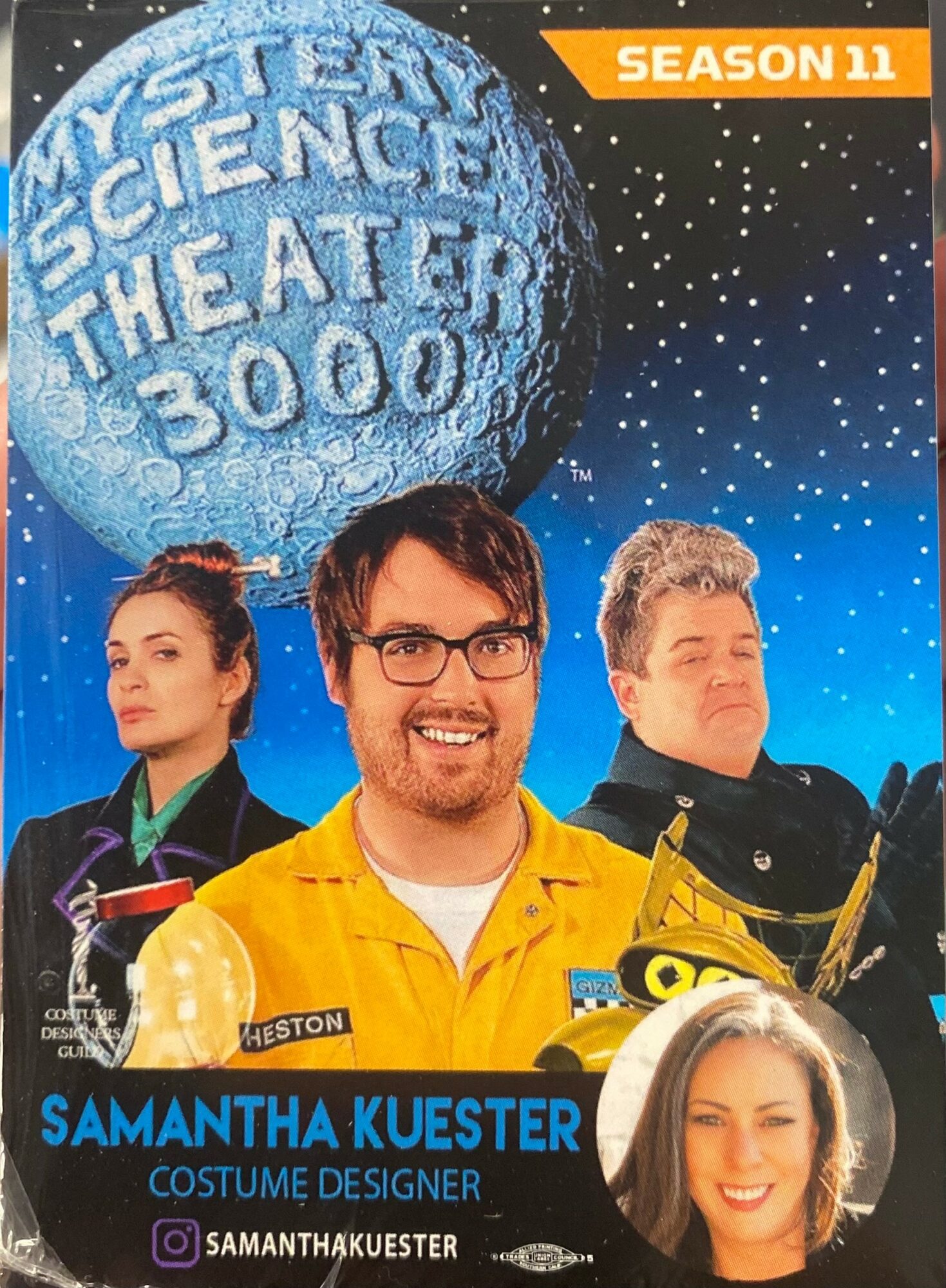 Poster for season 11 of a science comedy show featuring four people, a moon, and stars in space background.