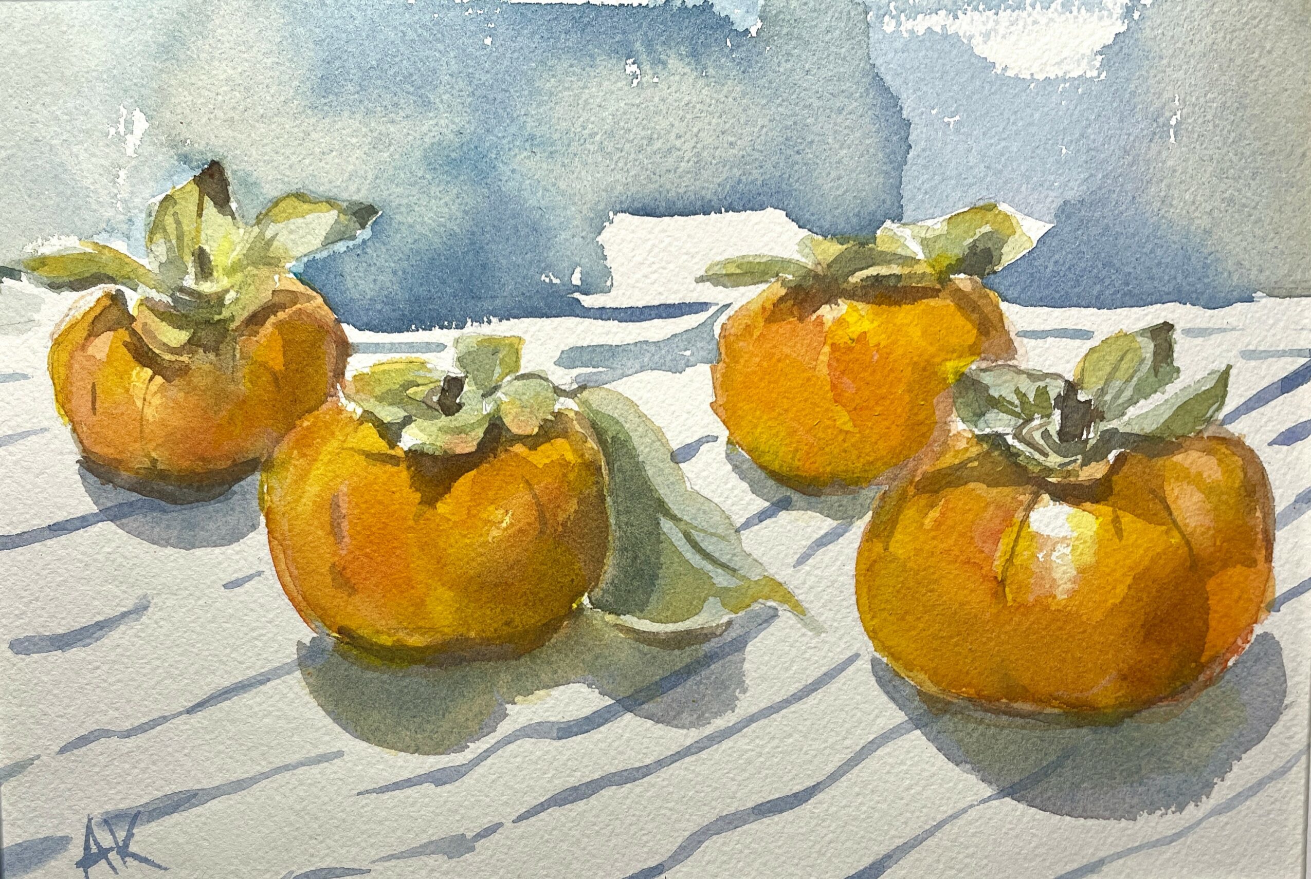 Four persimmons with green leaves on a striped surface, watercolor style, blue sky background.