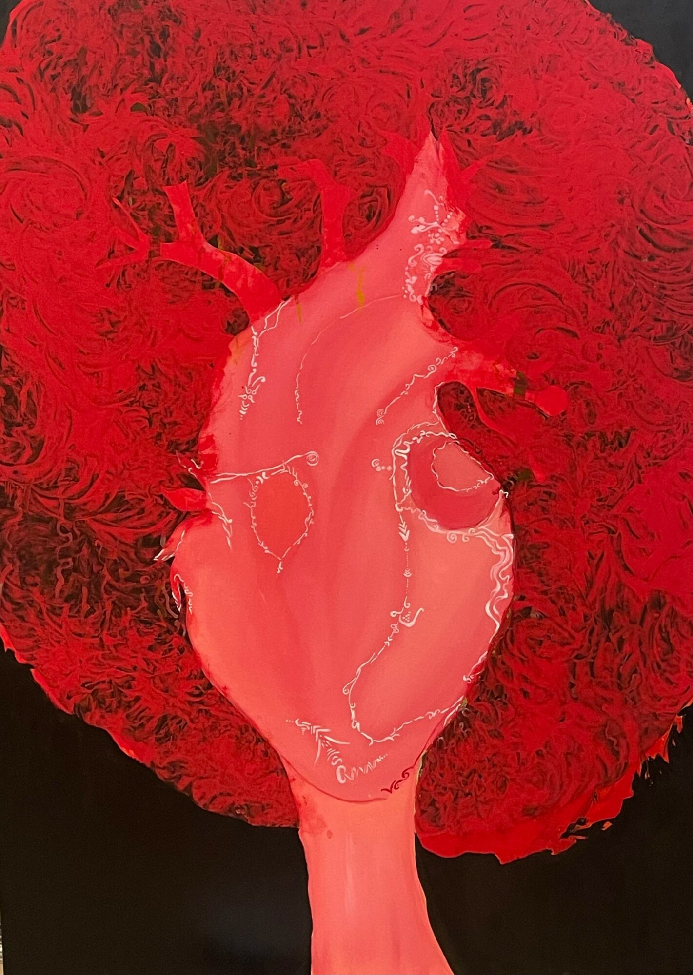 A stylized, abstract image of a human heart with red curly hair surrounding it.