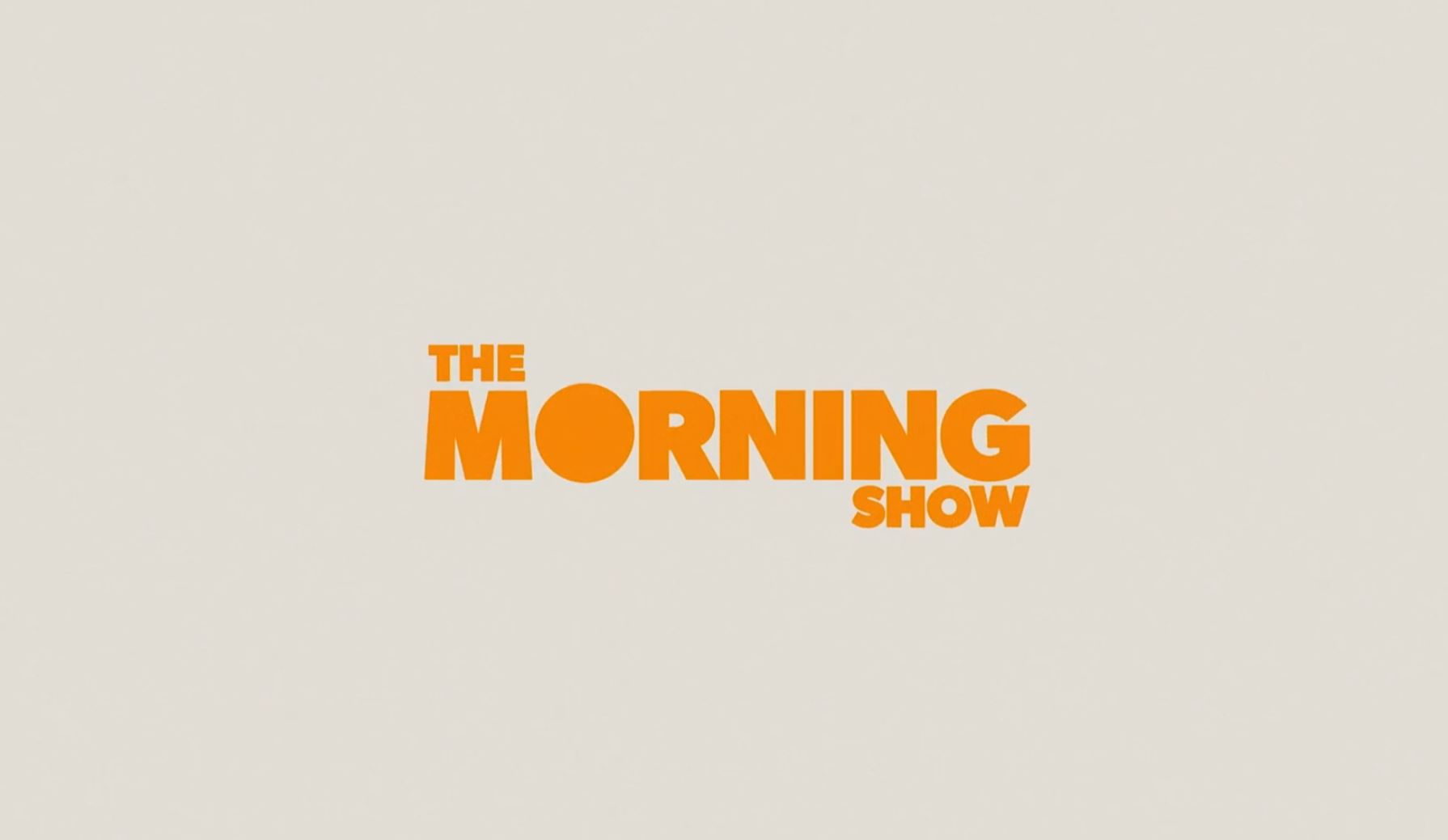 Logo with orange text reading 'The Morning Show' on a light background.