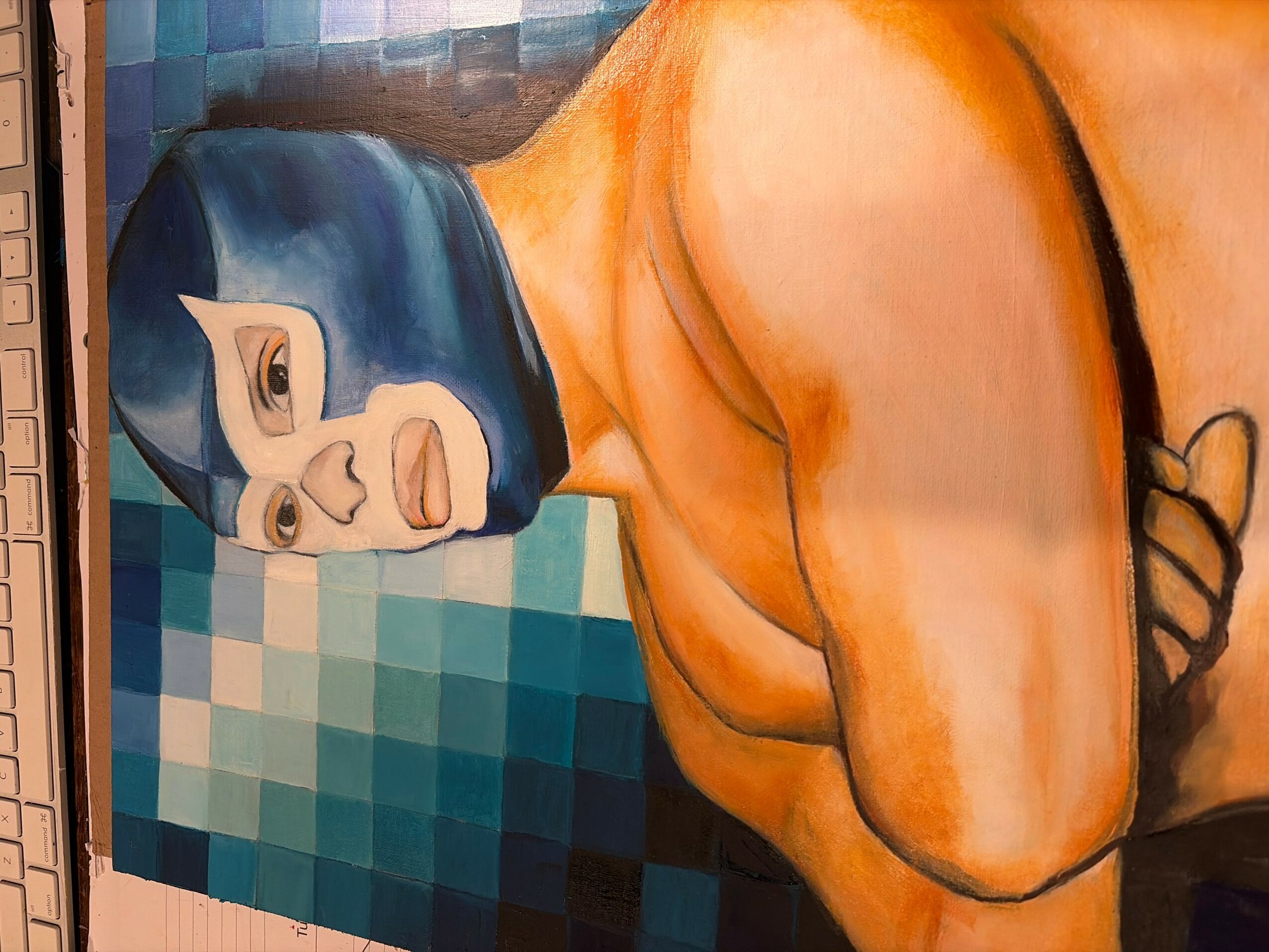 A mural of a person with a blue mask, muscular arm, and a pixelated background, painted on a wall.