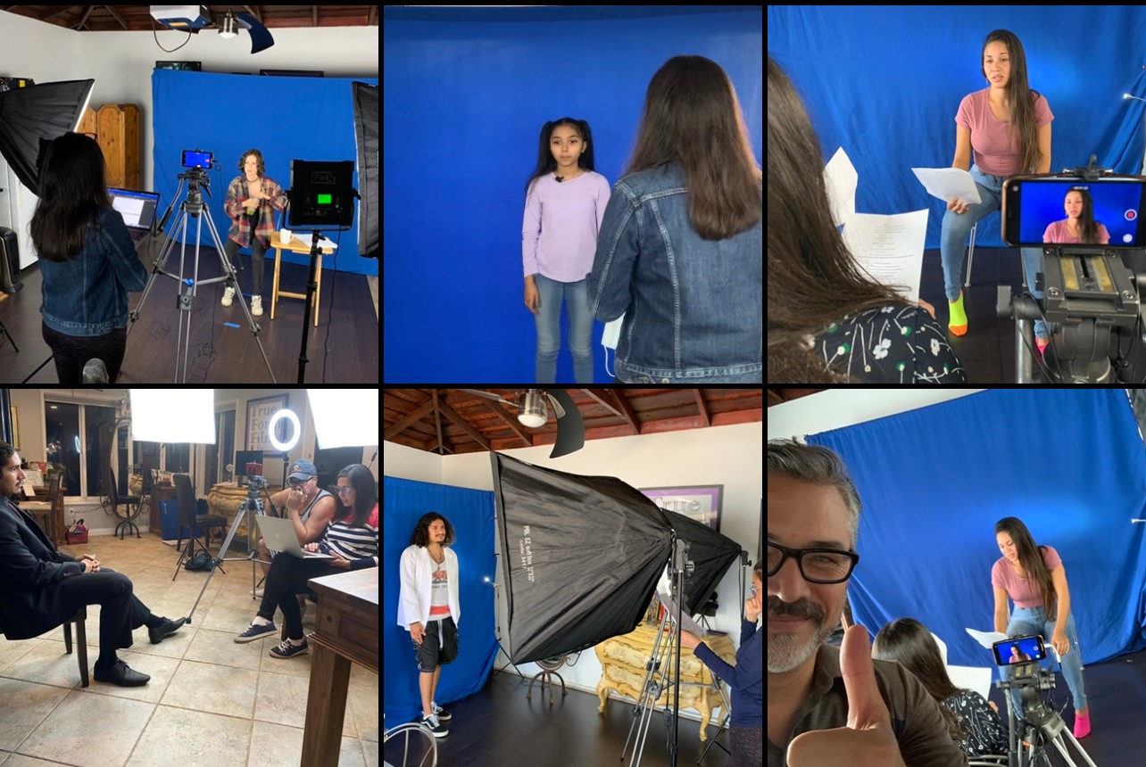 People in a studio with blue background, filming, and equipment, including a woman singing and a person with a camera.