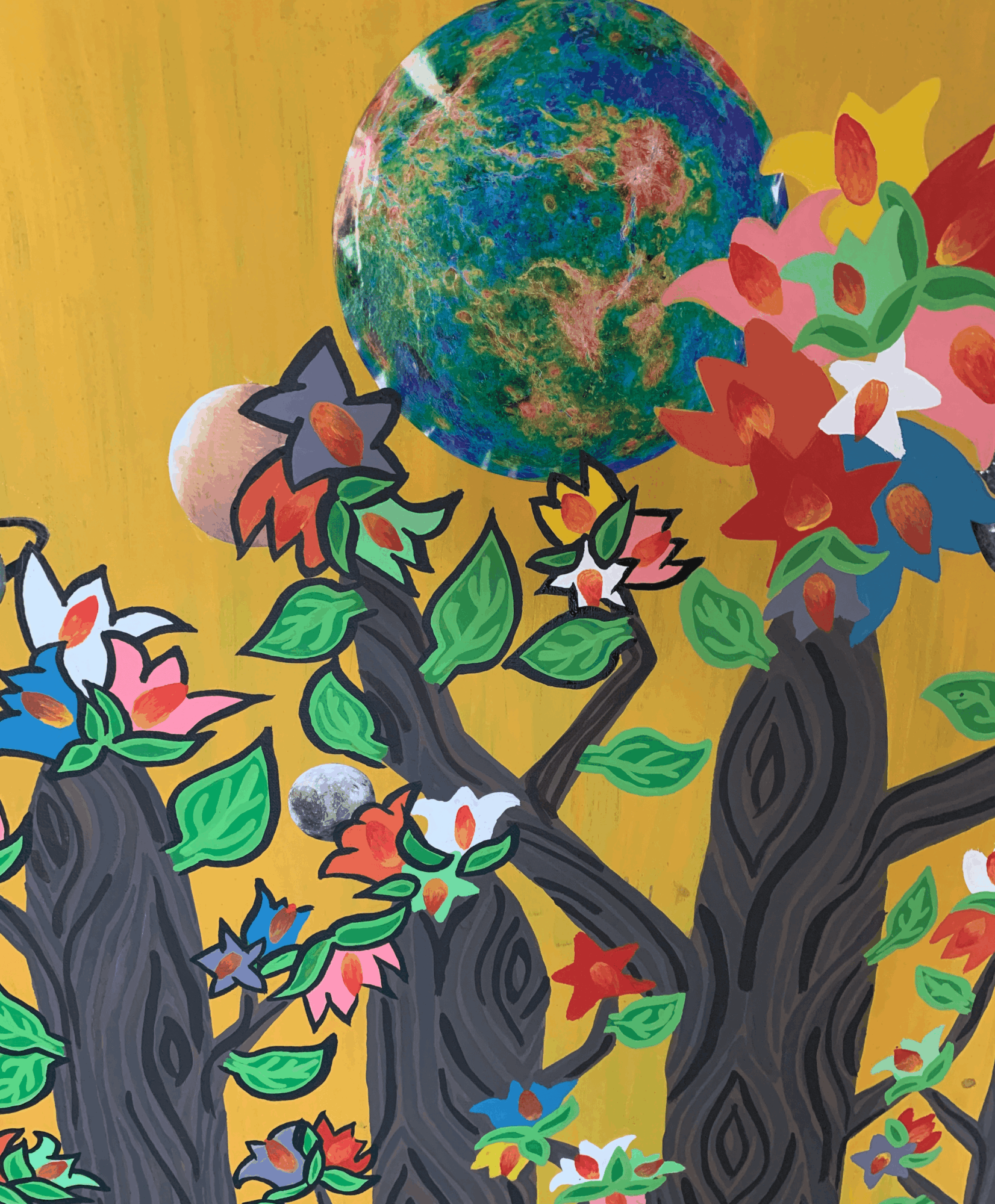 Colorful tree with flowers and a large Earth in the background, set against a yellow sky.