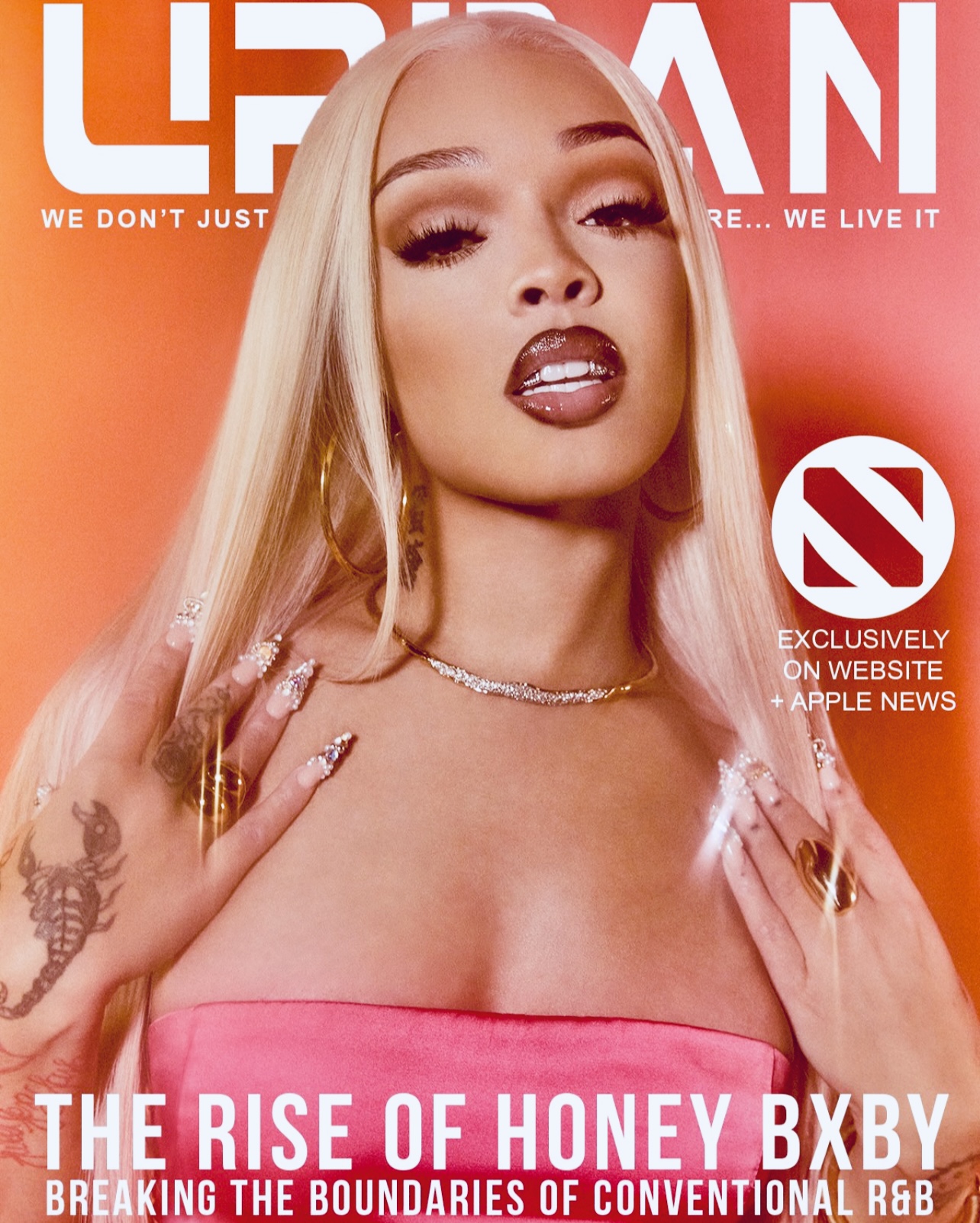 A woman with long blonde hair and makeup, wearing a pink strapless top, poses on magazine cover.