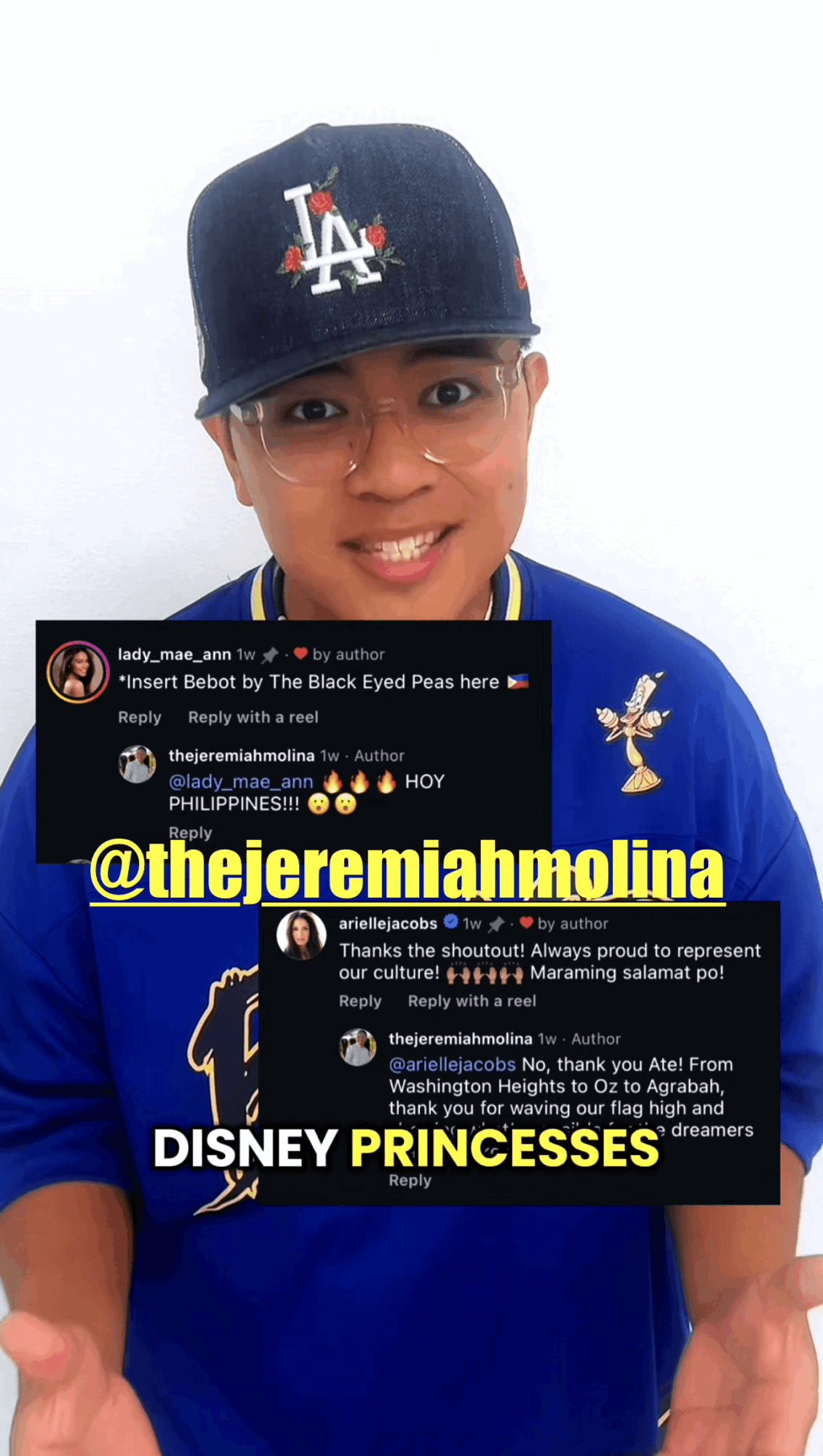Person wearing a black LA cap, glasses, and a blue shirt, smiling and holding a sign with social media comments, against a white background.