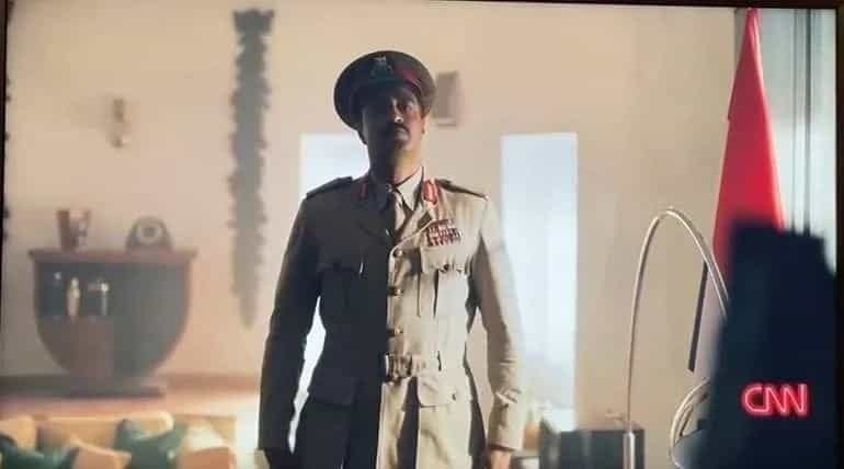 Person in military uniform standing indoors with sunlight behind, CNN logo in the corner.
