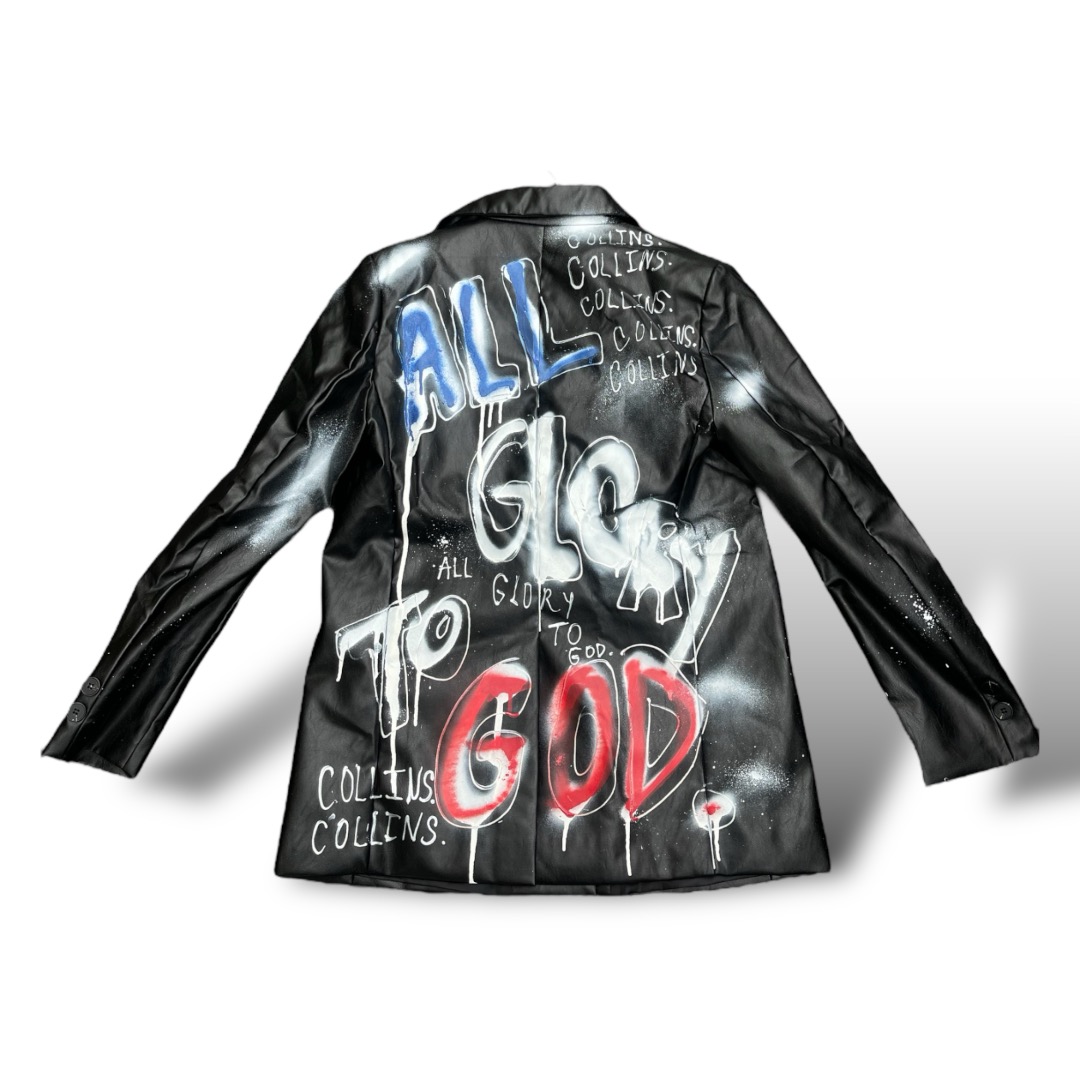 Black leather jacket with colorful graffiti-style text and designs, including the words 'ALL TO GOD' and 'GOD'.