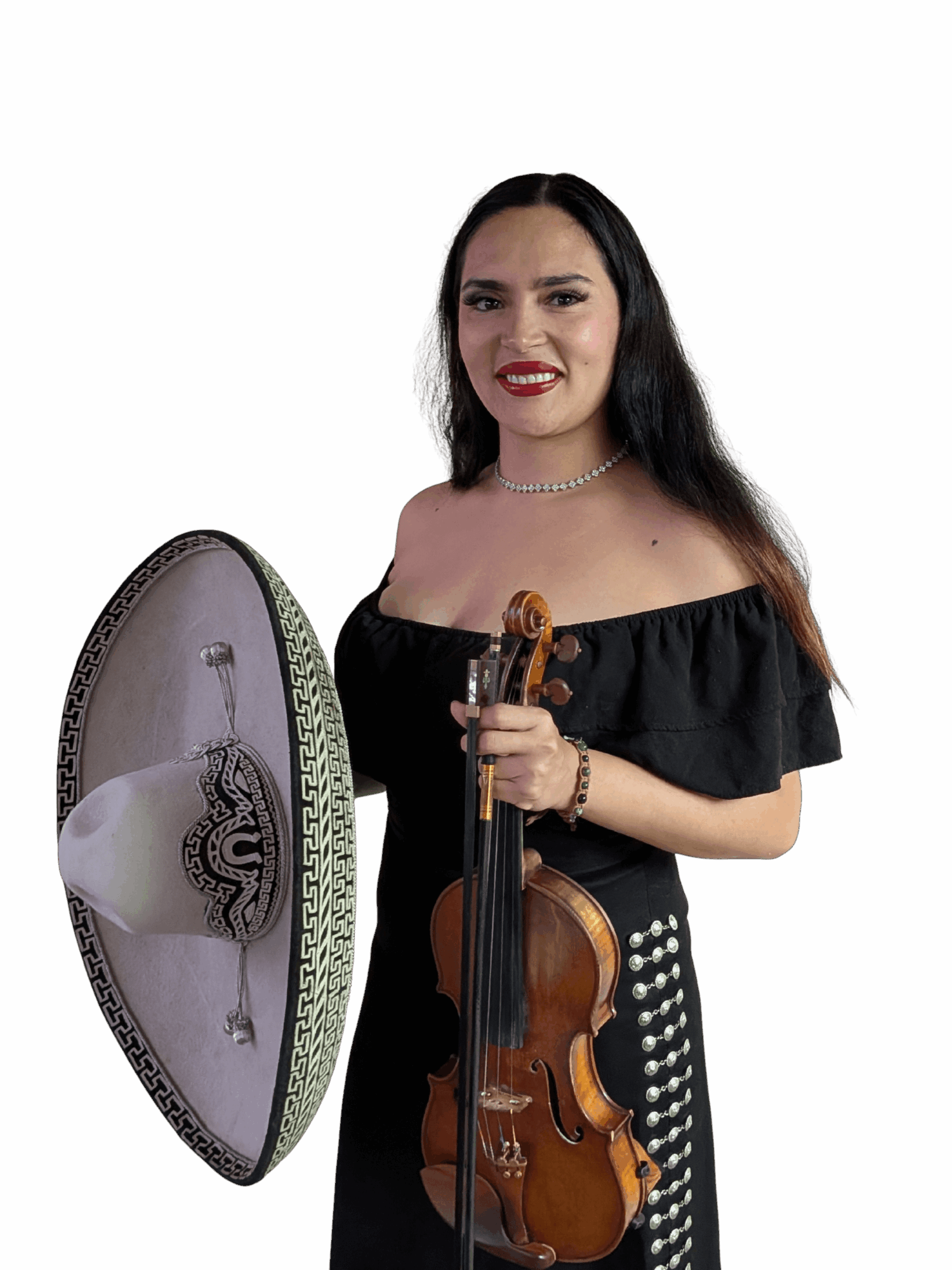 Woman with long dark hair holding a violin and bow, standing next to a large mirror, wearing a black off-shoulder dress, smiling.